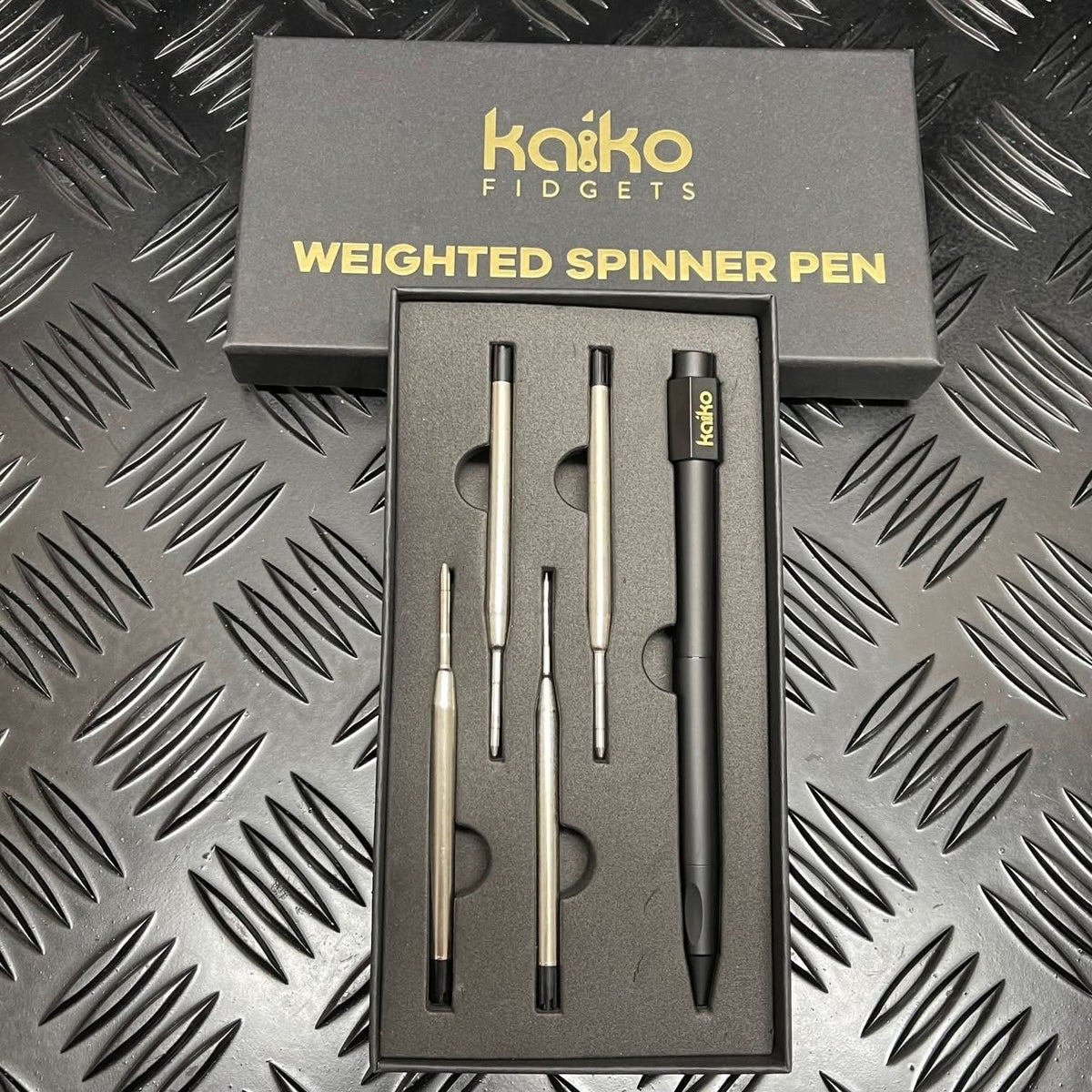 BLACK Weighted Spinner Pen with 4 refills