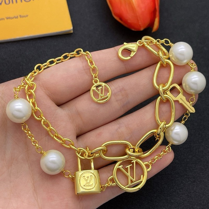 Louis Vuitton Pearl Lock Gold 18K Gold Bracelet