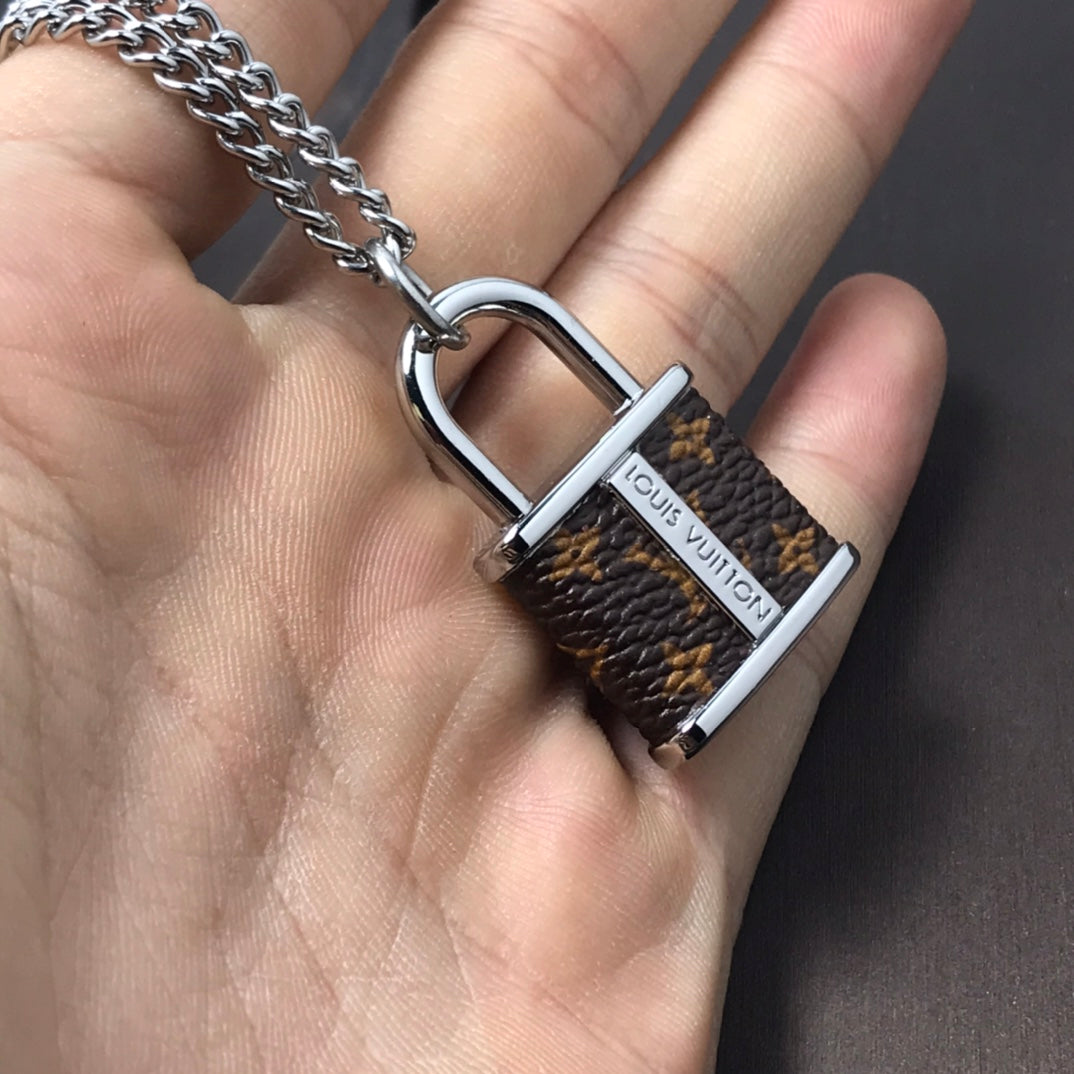 Louis Vuitton Monogram Lock Pendant 18K Gold Necklace