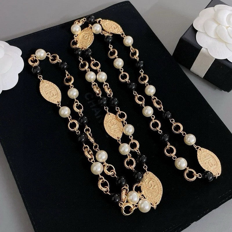 Chanel Long Black & White Pearls 18K Gold Necklace