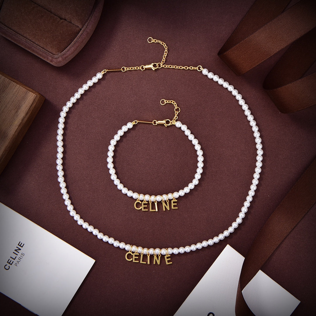 Celine Paris Pearls 18K Gold Bracelet